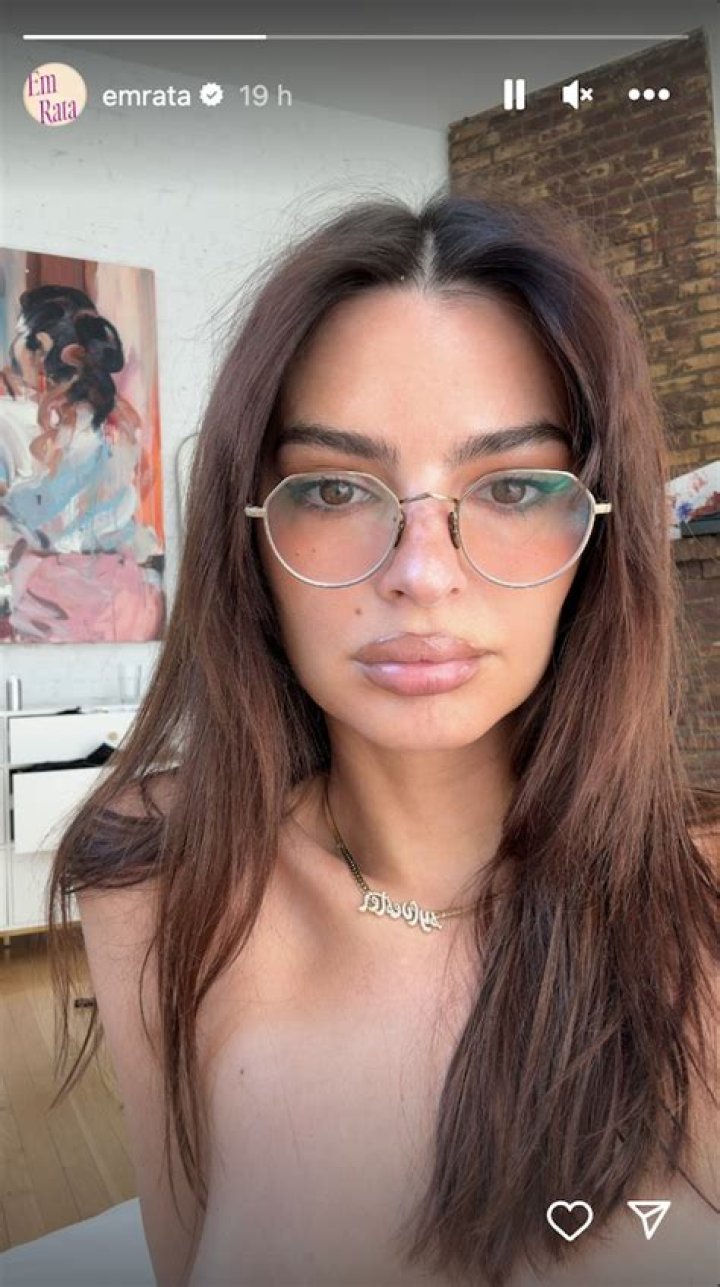 Selfie time:&nbsp;EmRata's first Instagram story post was taken in a hallway where she was showing off her white mini-dress with a selfie